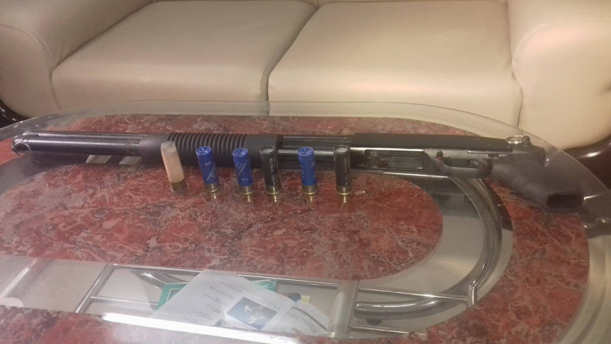 A shotgun and five bullets A shotgun and five bullets