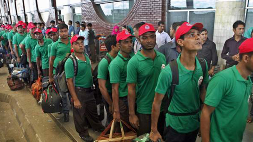This Star photo taken on August 27, 2013, shows Bangladeshi workers stand in line to enter Shahjalal International Airport in Dhaka, before flying to a foreign country for jobs.
