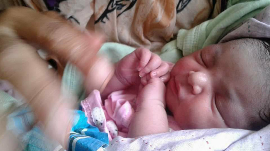 Newborn abandoned at a dustbin Newborn abandoned at a dustbin