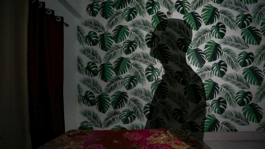 A person's shadow on a wall