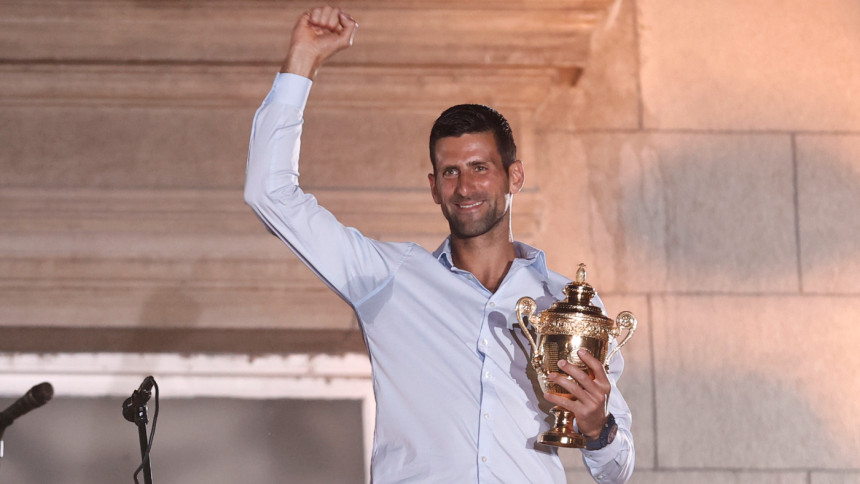 Serbia's Novak Djokovic celebrates his victory at the Wimbledon tennis tournament with supporters during a welcoming ceremony in Belgrade. Serbia's Novak Djokovic celebrates his victory at the Wimbledon tennis tournament with supporters during a welcoming ceremony in Belgrade.