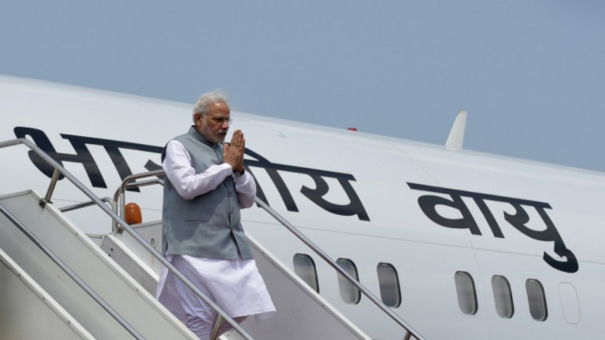 Modi flies in