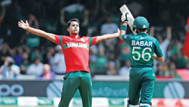 Bangladesh pace bowler Mohammad Saifuddin celebrates after dismissing Pakistan batsman Babar Azam