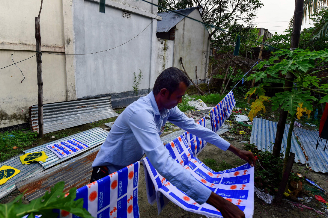 Salim Hawalader, owner of a factory that produces national flags