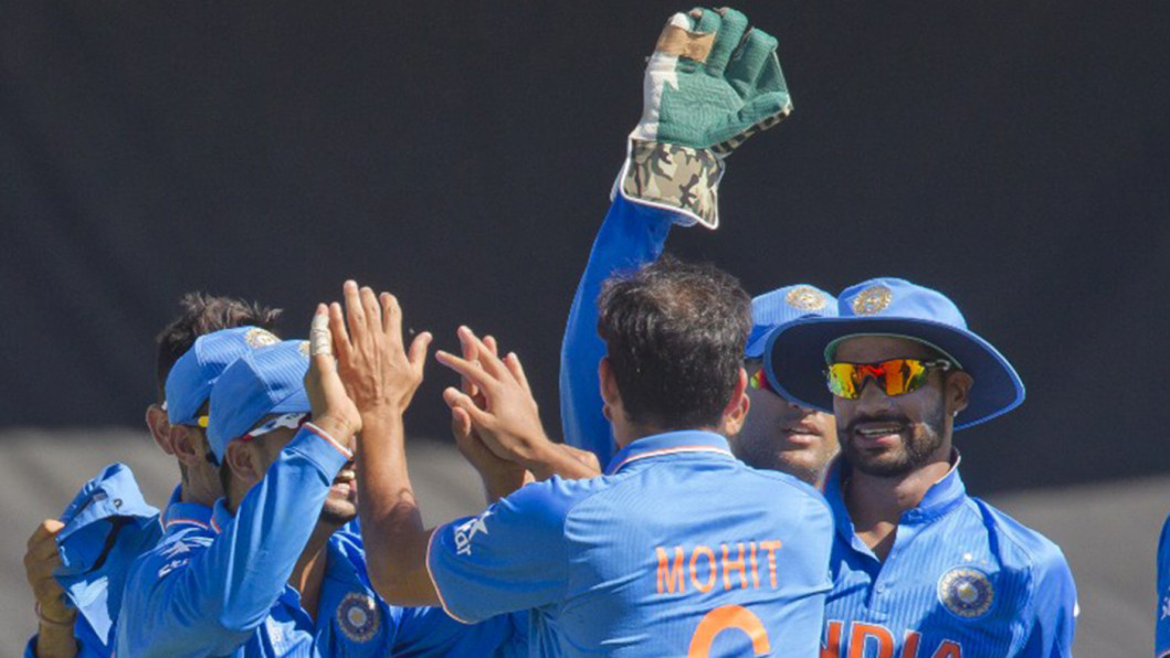 Indian fielders celebrate wicket Indian fielders celebrate wicket