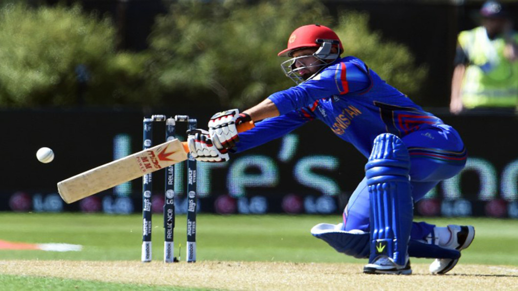 Afghanistan batsman Javed Ahmadi cracks a ball away Afghanistan batsman Javed Ahmadi cracks a ball away