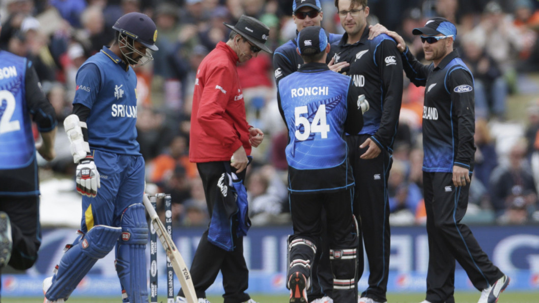 Teammates celebrate with Vettori New Zealand bowler Daniel Vettori
