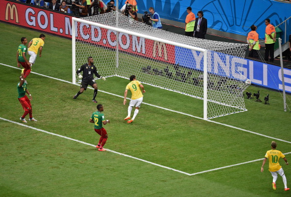 Brazil's forward Fred (9) scores a goal during their Group A football match against Cameroon in Brasilia on June 23, 2014. Photo: Getty Images