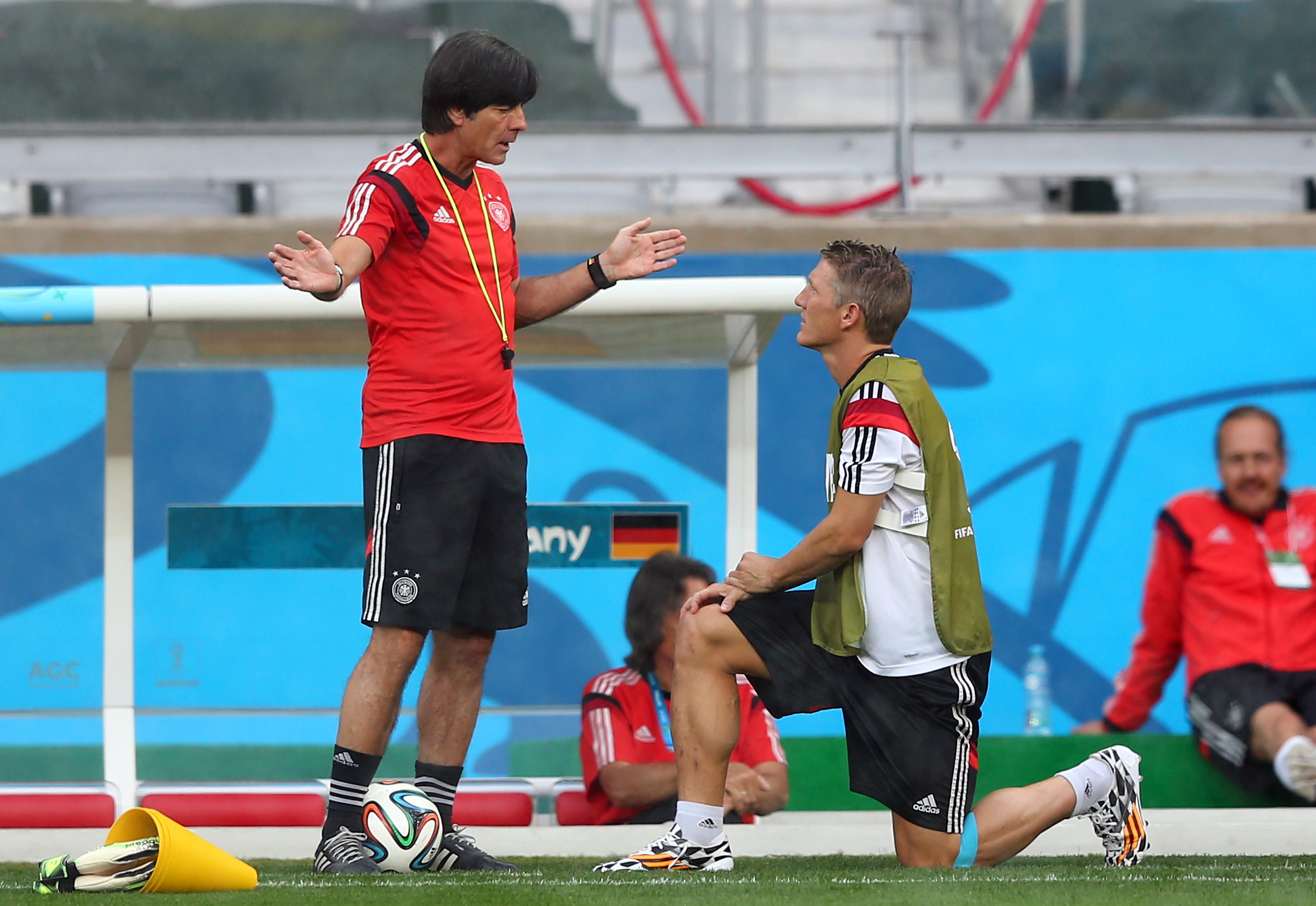 Joachim Loew (L), head coach of Germany talks to Bastian Schweinsteiger during the German national team training at Estadio Mineirao on July 7, 2014 in Belo Horizonte, Brazil. Photo: Getty Images