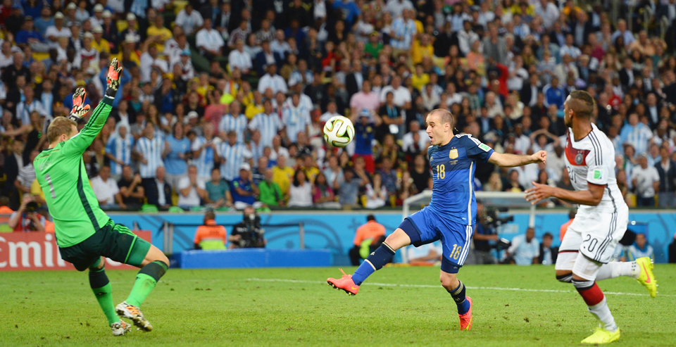 Rodrigo Palacio of Argentina shoots and misses wide against goalkeeper Manuel Neuer and Jerome Boateng of Germany during the final football match between Germany and Argentina for the FIFA World Cup at The Maracana Stadium in Rio de Janeiro on July 13, 2014. Photo: Getty Images