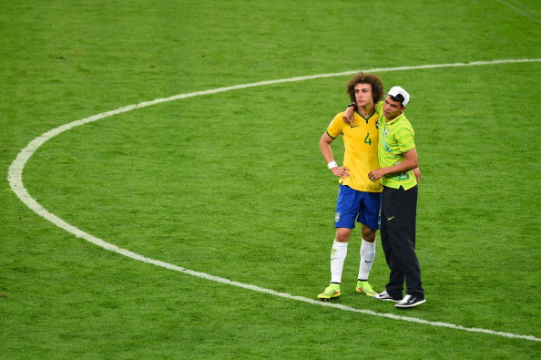  Thiago Silva of Brazil consoles David Luiz after Germany's 7-1 victory during the 2014 FIFA World Cup Brazil Semi Final match between Brazil and Germany at Estadio Mineirao on July 8, 2014 in Belo Horizonte, Brazil. Photo: Getty Images