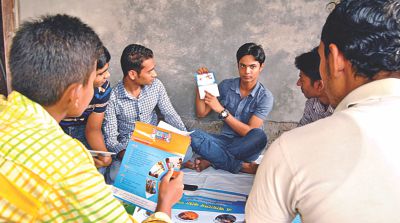 PR Trainer Sabbir talking about SRHR to young members of a youth  friendly service centre.