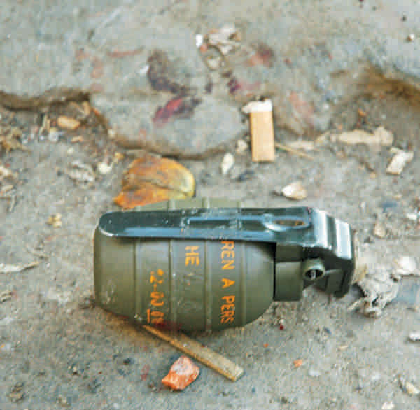An unexploded grenade from the scene of the 21st August blast. Photo: shawkat jamil