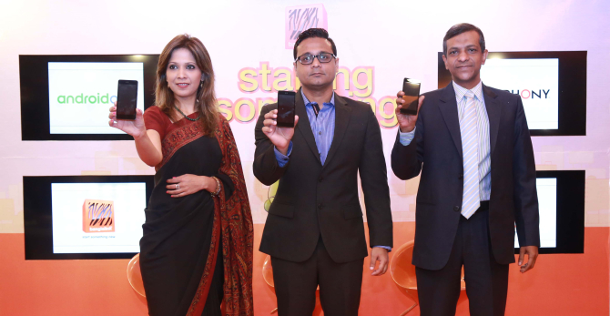 From left, Irum Iqbal, head of data, VAS and device marketing at Banglalink; Rezwanul Haque, senior director of Symphony, and Ashraful Hoq, assistant director, attend a programme in Dhaka yesterday, to announce the companies' initiative to launch an Android One phone in January. Photo: Banglalink