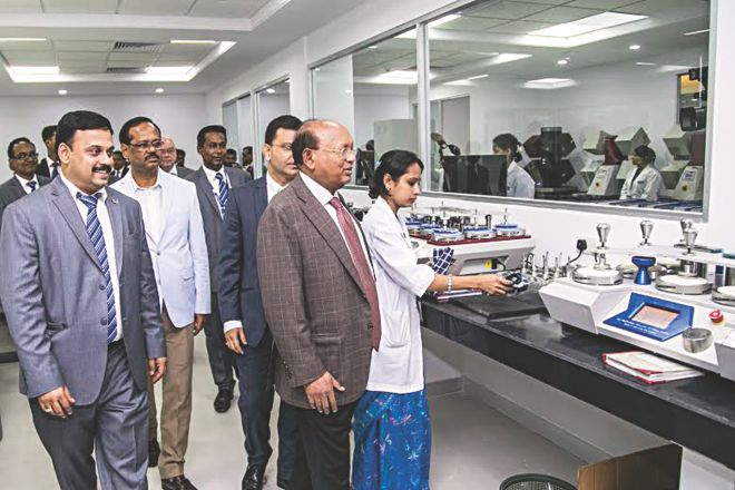 Commerce Minister Tofail Ahmed looks around after inaugurating Intertek's testing lab in Dhaka yesterday.  Photo: INTERTEK