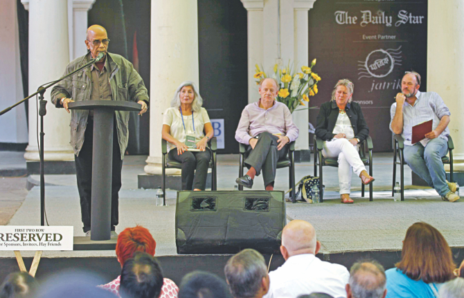 Poet Syed Shamsul Huq addresses the inaugural ceremony of Hay Festival Dhaka 2014 at Bangla Academy premises. On his left are seen Iranian-born British poet Mimi Khalvati, PEN International President John Ralston Saul, festival director of the original Hay, Lyndy Cooke and noted historian William Dalrymple.   Photo: Star