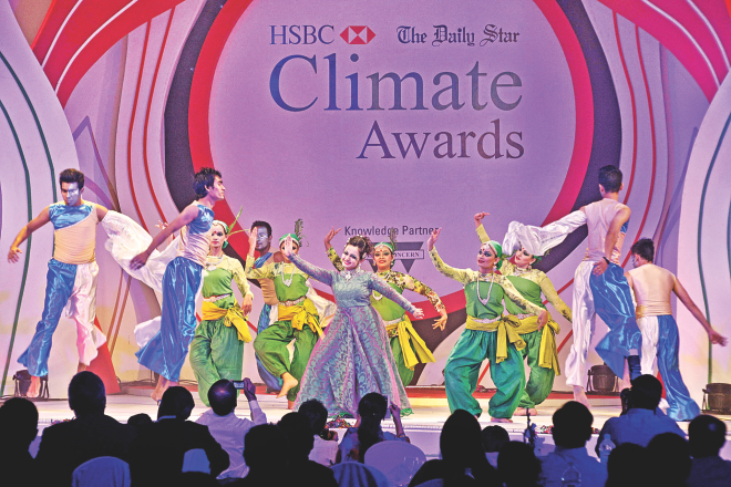 Dancers perform at the distribution ceremony of the HSBC-The Daily Star Climate Awards 2013" at the capital's Ruposhi Bangla Hotel last night. Photo: Star