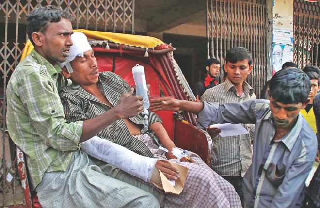 A man being taken to a hospital after Jamaat activists beat him up for going to a polling station to vote in Satkania of Chittagong yesterday. Photo: Anurup Kanti Das