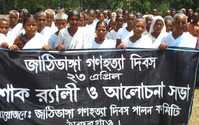 Women, left widowed by the brutal killing of their husbands at the hands of Pakistan occupation army and their local collaborators on April 23, 1971, join a mourning procession at Jagannathpur in Thakurgaon Sadar upazila yesterday marking Jhathibhanga massacre day. PHOTO: STAR