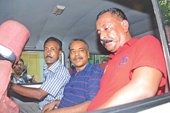 Nur Hossain, centre, the prime accused in the Narayanganj seven-murder, and his two 