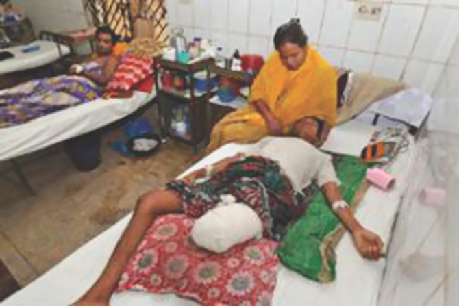 Limon, in a hospital bed after his leg had to be amputated. He was shot in the leg in March 2011. Photo: File