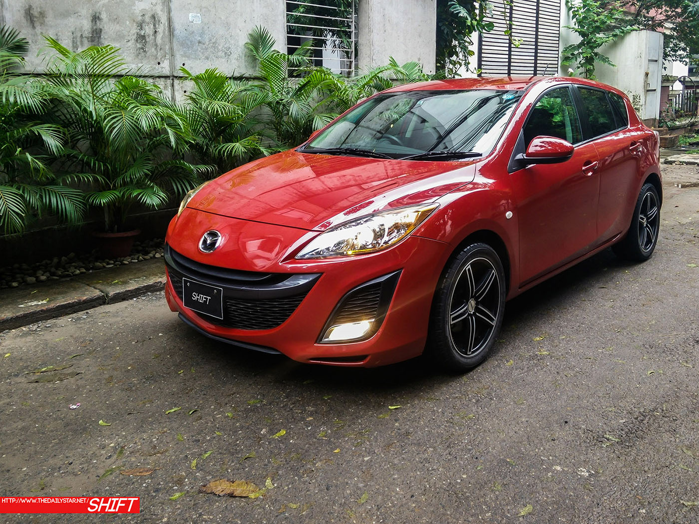 Front end of the Axela: cause for much debate; ultimately, that grin is kind of creepy even if the car looks modern. Photo: Aadnan Zaman