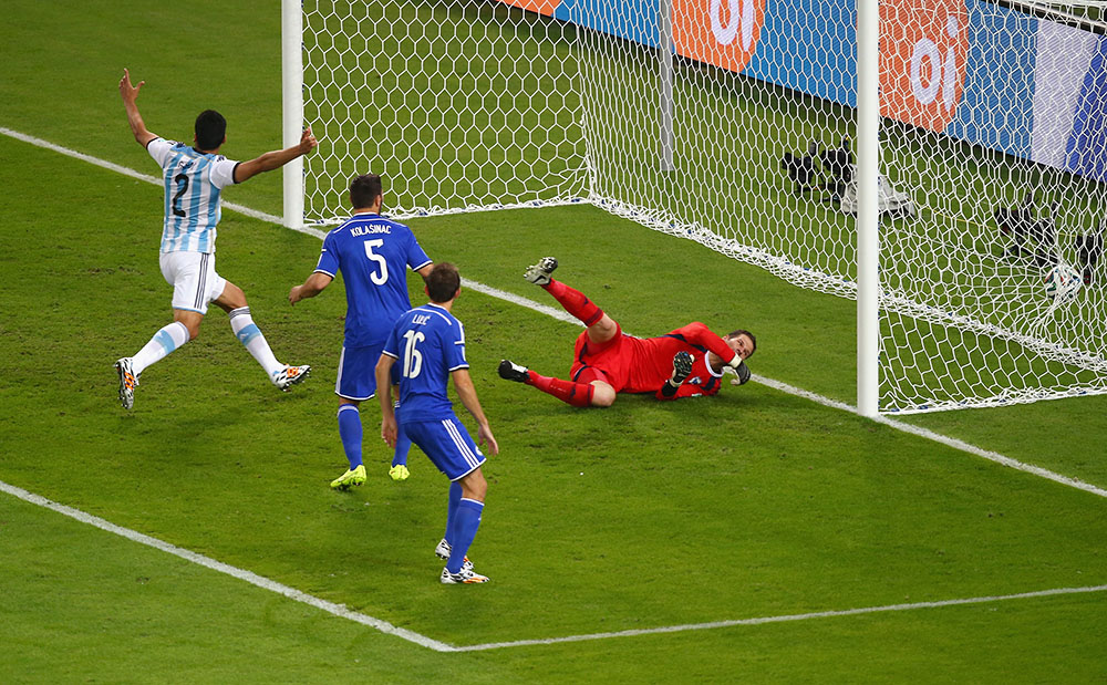 Sead Kolasinac of Bosnia and Herzegovina scores an own goal past goalkeeper Asmir Begovic as Ezequiel Garay and Federico Fernandez of Argentina look on during the 2014 FIFA World Cup Brazil Group F match between Argentina and Bosnia-Herzegovina at Maracana on June 15, 2014 in Rio de Janeiro, Brazil. Photo: Getty Images