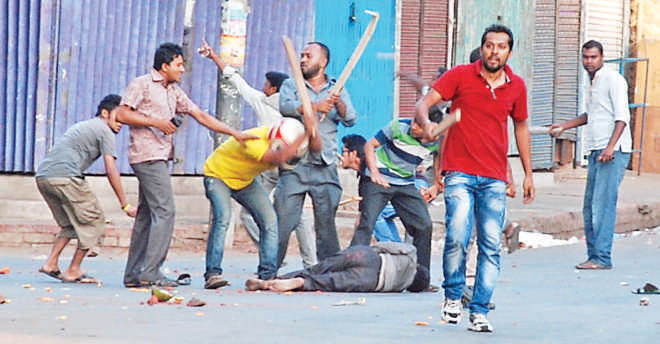 Goons belonging to Bangladesh Chatra League beat up an opposition supporter.  Photo: Star File