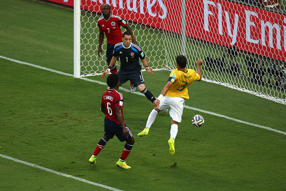 Thiago Silva of Brazil scores his team's first goal past David Ospina of Colombia during the 2014 FIFA World Cup Brazil Quarter Final match between Brazil and Colombia. Photo: Getty Images