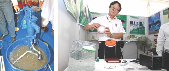 Left, A tubewell powered by a solar panel is marketed by Ifada Electronics, and a waterproof solar bulb is innovated by Sinoware Technology. Both inventions are on display at the Green Expo and Summit organised by ExpoNet Exhibition at Bangabandhu International Conference Centre in Dhaka yesterday. Photo: Star