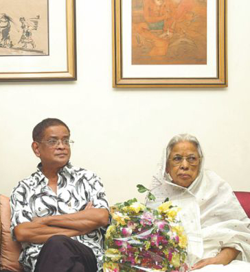 This photo shows writer Humayun Ahmed celebrates one of his birthdays with his mother Ayesha Faiz.