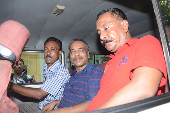 Nur Hossain, centre, the prime accused in the Narayanganj seven-murder, and his two 