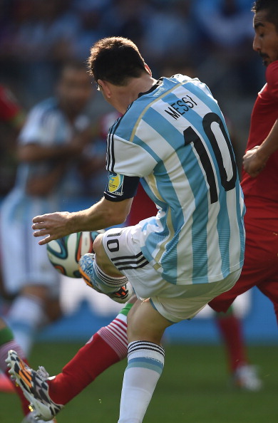 Argentina's forward and captain Lionel Messi strikes the ball to score a goal during a Group F football match between Argentina and Iran at the Mineirao Stadium in Belo Horizonte during the 2014 FIFA World Cup in Brazil on June 21, 2014. Photo: Getty Images