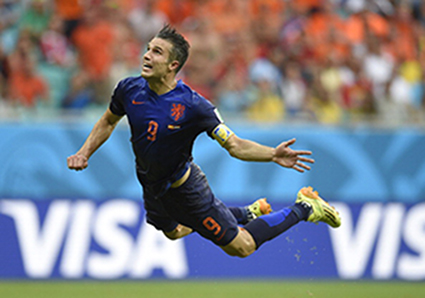 Netherlands' forward Robin van Persie scores during a Group B football match between Spain and the Netherlands at the Fonte Nova Arena in Salvador during the 2014 FIFA World Cup on June 13, 2014. Photo: Getty Images