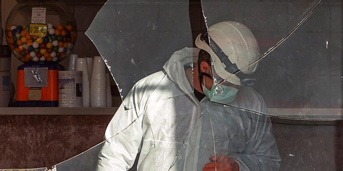 A police investigator inspects the scene after an attack at a kebab restaurant near el Houda mosque in Villefrance-Sur-Saone near Lyon January 8, 2015 the day after a shooting at the Paris offices of Charlie Hebdo. Photo: Reuters