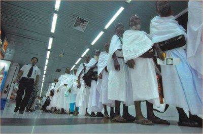 Hajj pilgrims are crossing the boarding bridge at Hazrat Shahjalal International Airport. Star file photo