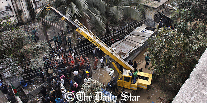 Rescuers and local people are seen near the well at Shahjahanpur in the capital today from where the body of a four-year-old boy, Jihad, was rescued after over 23 hours of the child’s accidental fall into it. Photo: Rashed Shumon 