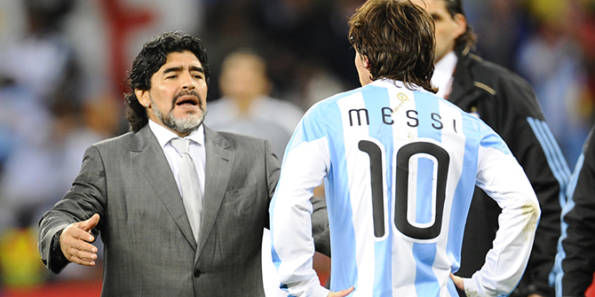 Argentina's coach Diego Maradona (L) looks dejected in front of Argentina's striker Lionel Messi after they lost the 2010 World Cup quarter-final football match Argentina vs. Germany on July 3, 2010 at Green Point stadium in Cape Town. Germany qualified for the semi-finals. Photo: AFP/Getty Images