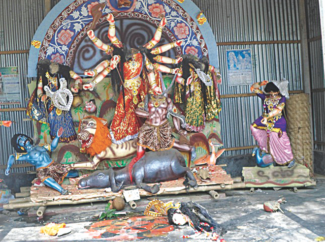In this February 26 Star photo, criminals vandalise the idols of a Hindu temple at Bathania Chala of Kaliakoir in Gazipur. 